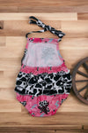 Pink yeehaw bull skull printed baby onesie with ruffle butt. SR020317-amy