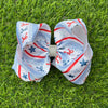 6.5"  Patriotic coquette bow with Lt. blue, white, red stripe blue. 4pcs/$10.00 BW-DSG-5097