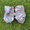 6.5"  Patriotic coquette bow with Lt. blue, white, red stripe blue. 4pcs/$10.00 BW-DSG-5097
