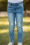 Distressed skinny jeans with snapped pearls. PNG25113064 SOL