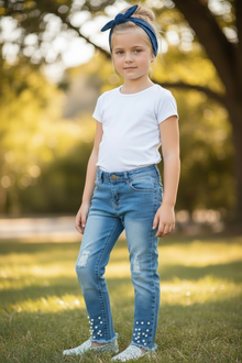  Distressed skinny jeans with snapped pearls. PNG25113064 SOL