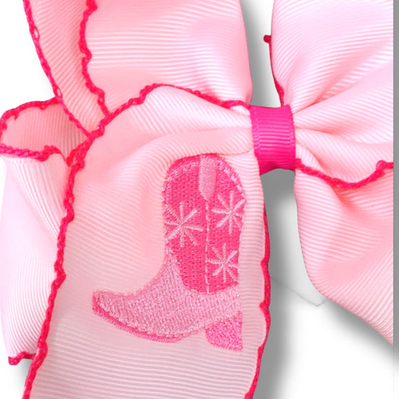 5" Pink western boot embroidered hair bow with fuchsia moon stitch. 3pcs/$12.00 BW-DSG-B303
