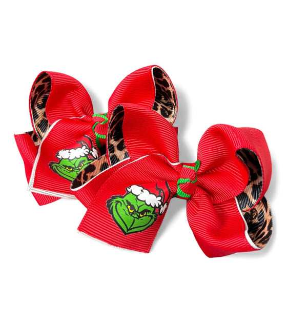 3" Christmas character double ribbon hair bows. Available in 2 colors! 12pcs/16.50