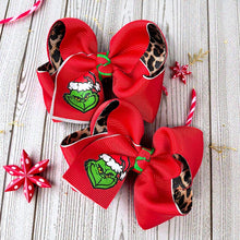  3" Christmas character double ribbon hair bows. Available in 2 colors! 12pcs/16.50