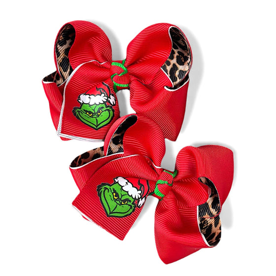 3" Christmas character double ribbon hair bows. Available in 2 colors! 12pcs/16.50
