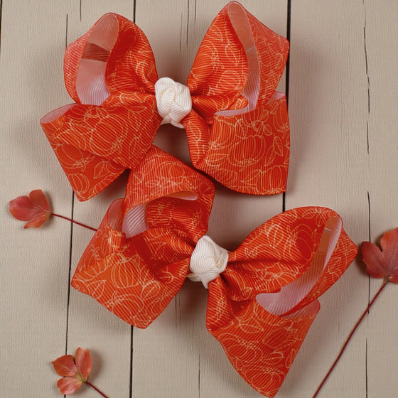 Approx. 4"  pumpkin printed mini bows. 12pcs/$13.99 BW-DSG-B271