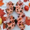 Approx. 4"  pumpkin printed mini bows. 12pcs/$13.99 BW-DSG-B272