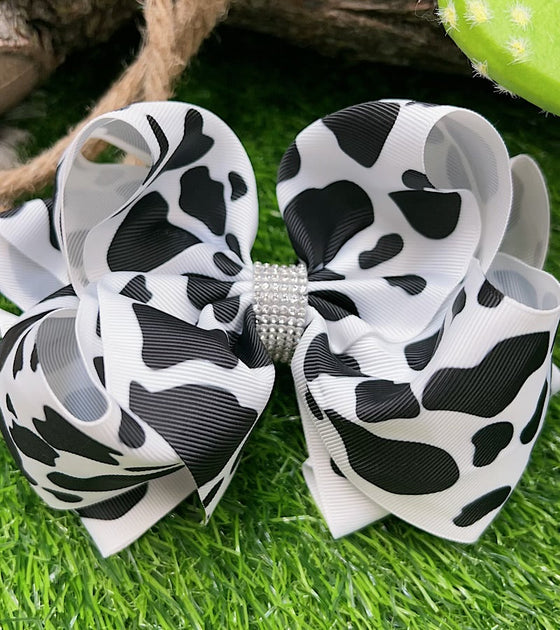 BLACK & WHITE COW SPOT PRINTED HAIR BOW. 7.5" WIDE 4PCS/$10.00 BW-DSG-99