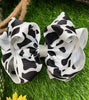 BLACK & WHITE COW SPOT PRINTED HAIR BOW. 7.5" WIDE 4PCS/$10.00 BW-DSG-99