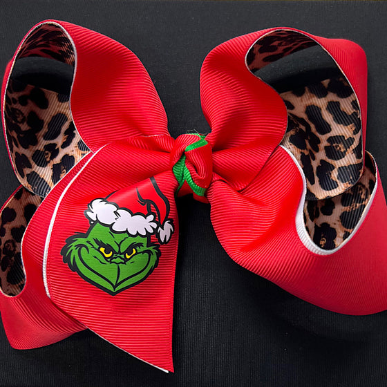6.5" Christmas character printed bow w/red & cheetah printed ribbon. 4pcs/$10.00 BW-DSG-B279