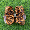 6.5" Golden brown leopard printed double layer hair bows. 4pcs/$10.00 BW-DSG-5089
