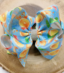  FRESH ORANGE PRINTED HAIR BOWS WITH RHINESTONES 7.5IN WIDE 4PCS/$10.00 BW-DSG-359.