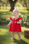 Embroidered neckline with strawberry red tunic & gingham bottoms. OFG60257 AMY