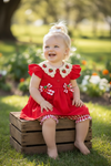 Embroidered neckline with strawberry red tunic & gingham bottoms. OFG60257 AMY