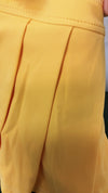 Mustard pleaded skort made of HI-Performance fabric. GLK103007-JEAN