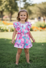 Multi-patch printed romper with ruffle sleeves. PNG60118 AMY