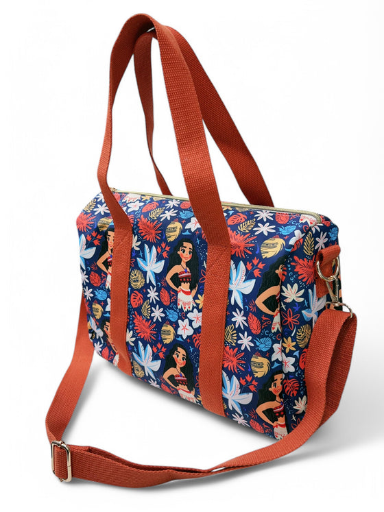 Navy blue character printed girls duffle bag.