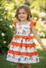 Dog printed character dress with ruffle trim. DRG60225 AMY