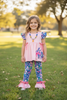 Coral Easter bunny applique tunic & floral bell bottoms.OFG60225 SOL