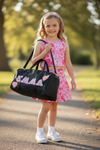 Kids customizable duffle bags, made in durable materials. Available in 8 colors!
