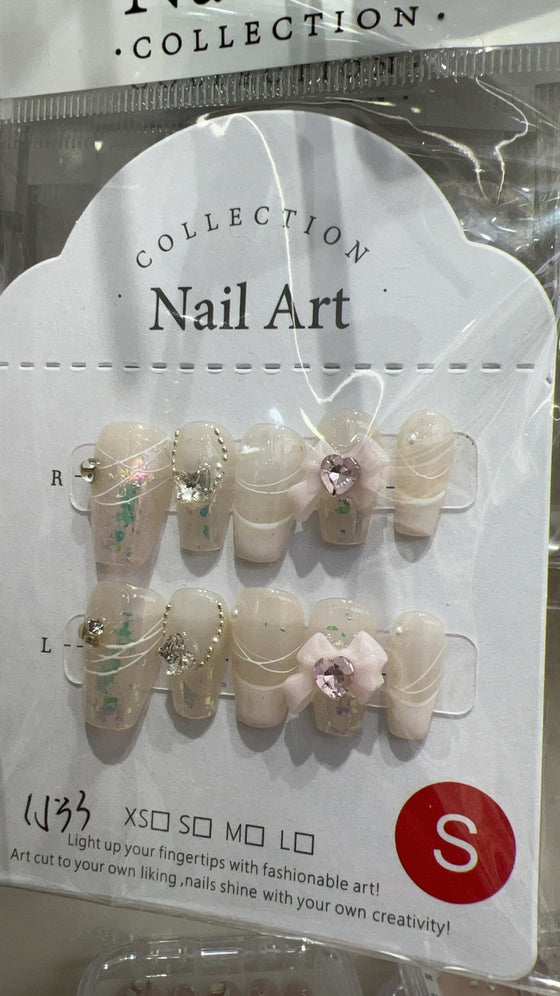 Hand made press on women acrylic nails with stones.