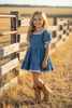 Denim blue Wide flare denim dress with white lace hem. DRG60290 JEAN