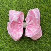 6.5" Lt. Pink cow printed /rhinestone alligator hair bow. 4pcs/$10.00 B103