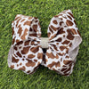 6.5" Brown Cow printed hair bows. 4pcs/$10.00. BW-DSG-5074