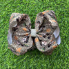 6.5"Cartoon Character-Safari w/Cheeta printed hair bows. 4pcs/$10.00. BW-DSG-5076