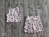 Lt. Pink multi-color butterfly & floral Hi-Performance top & skort. GSD013002-JEAN