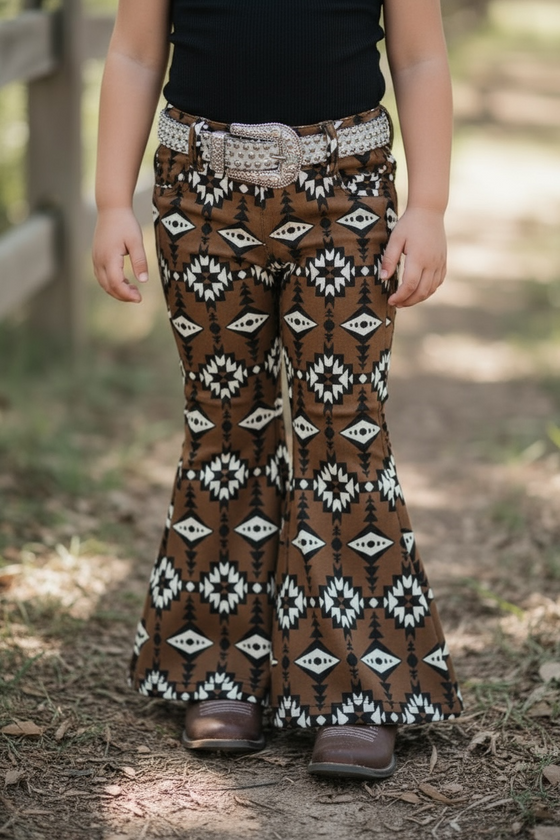 Brown aztec printed bootcut denim pants. PNG25153091 amy