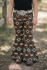 Brown aztec printed bootcut denim pants. PNG25153091 amy