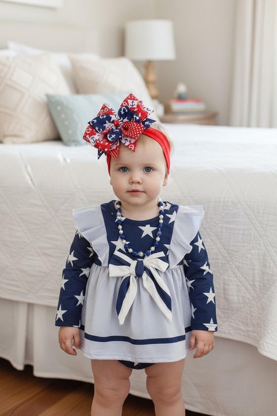 Star printed on navy & lt.gray skirt baby bodysuit w/ snaps. RPG41375 Jean