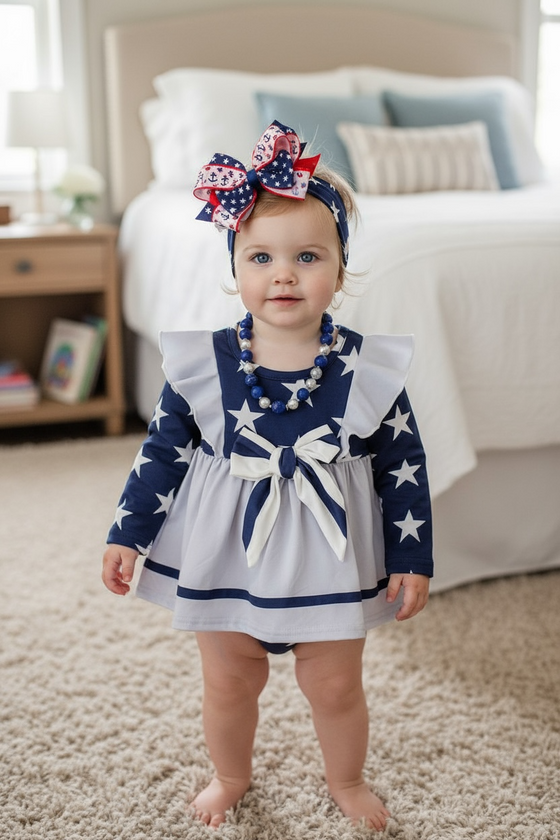 Star printed on navy & lt.gray skirt baby bodysuit w/ snaps. RPG41375 Jean