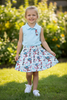 Dr. S tank top and multi-printed skort. OFG53496 SOL