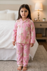 Christmas tree printed on pink girls pajamas. GLP080707-AMY