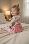 Santa printed on pink with ruffle hem & ruffle butt onesie. LR080713-SOL