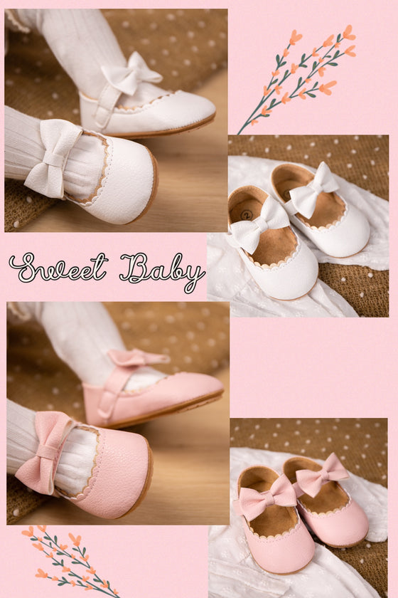 White pleather baby shoes. HM1628