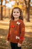 Brown pumpkin and bow knit pullover sweater. TPG50762 AMY