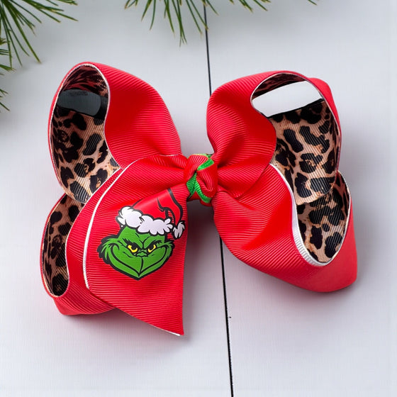 6.5" Christmas character printed bow w/red & cheetah printed ribbon. 4pcs/$10.00 BW-DSG-B279