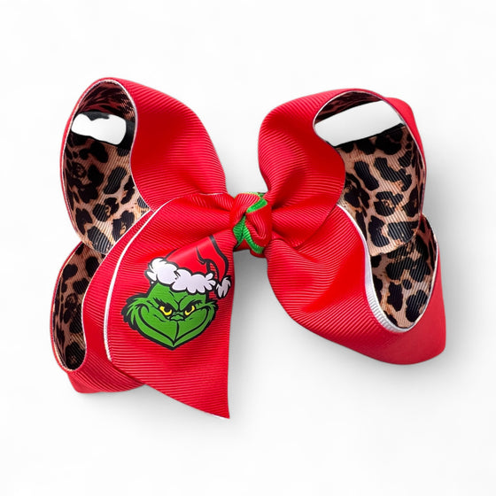 6.5" Christmas character printed bow w/red & cheetah printed ribbon. 4pcs/$10.00 BW-DSG-B279