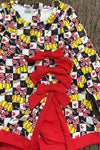 Black & white checkered softball dress and red hem. HI-Performance dress. GLD0508-3-SOL