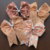 Cute fall floral and Ghost printed hair bows. 5pcs/$10.00