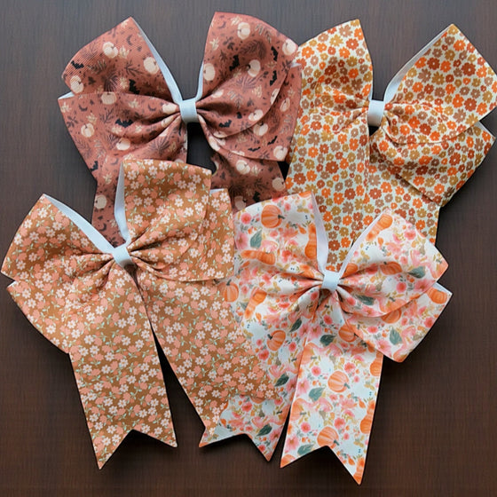 Cute fall floral and Ghost printed hair bows. 5pcs/$10.00