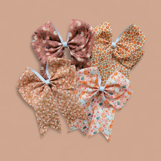 Cute fall floral and Ghost printed hair bows. 5pcs/$10.00