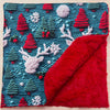Red nose reindeer on green Christmas baby blanket.