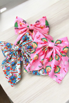 Christmas Character satin made coquette  bows w/alligator clip. 6pcs/$15.00