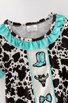 Cow printed baby romper with aqua ruffle hem. RPG64274 JEAN
