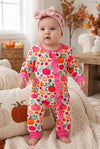 Multi color pumpkin printed baby romper with fuchsia contrast. RPG64312 Mon
