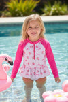 Ditsy floral swimsuit with fuchsia long sleeves. Amy